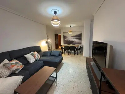 Una televisión o centro de entretenimiento en Apartamento Verónica 6 Sevilla Free Parking