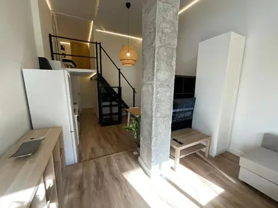 Una televisión o centro de entretenimiento en Apartamentos Parque Veronica 1 Y 2