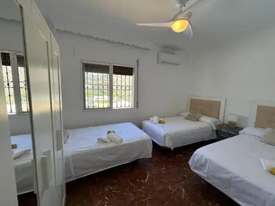 Cama o camas de una habitación en Casa Rural Alora Caminito del Rey