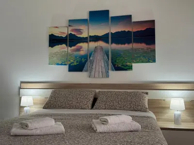 Cama o camas de una habitación en Apartamento Céntrico Puente Romano