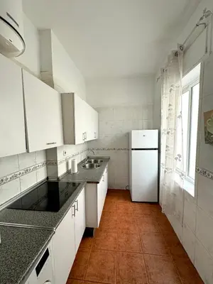 Una cocina o zona de cocina en Apartamento Céntrico Puente Romano