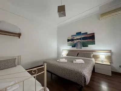 Cama o camas de una habitación en Apartamento Céntrico Puente Romano