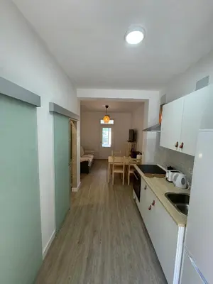 Una cocina o zona de cocina en Apartamento Búho - Junto al Castillo