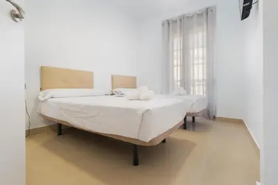 Cama o camas de una habitación en Panther Home Alameda