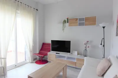 Una televisión o centro de entretenimiento en RentalSevilla El rincón de la Alameda de Hércules