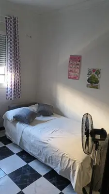 Cama o camas de una habitación en Magnifica Ubicación