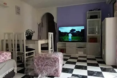 Una televisión o centro de entretenimiento en Magnifica Ubicación