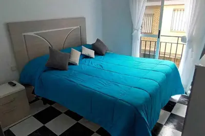 Cama o camas de una habitación en Magnifica Ubicación