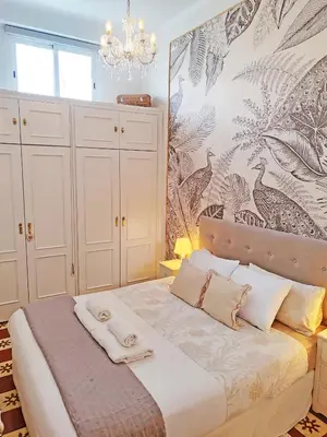 Cama o camas de una habitación en Casita Macarena