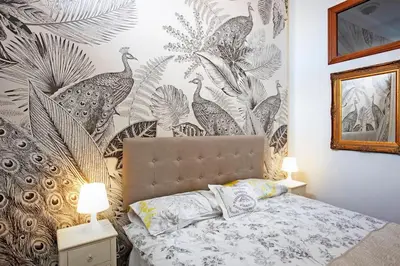 Cama o camas de una habitación en Casita Macarena