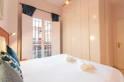 Cama o camas de una habitación en Stylish duplex - Pool - Seville Historical Center