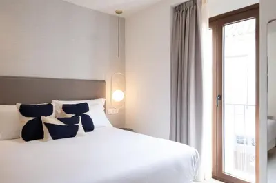 Cama o camas de una habitación en Hotel Cetina Casa de Aguilar