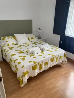Cama o camas de una habitación en Rialto céntrico patio sevillano