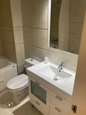 Un baño de Rialto céntrico patio sevillano