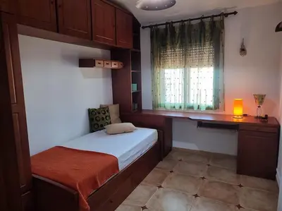 Cama o camas de una habitación en Como en casa