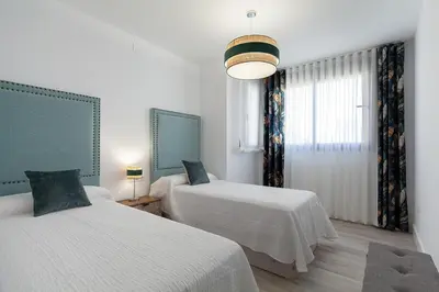 Cama o camas de una habitación en Espectacular piso en Nervión