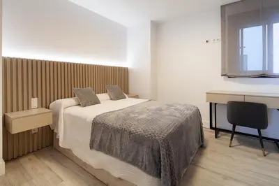 Cama o camas de una habitación en Espectacular piso en Nervión