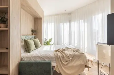 Cama o camas de una habitación en Líbere Córdoba Tendillas
