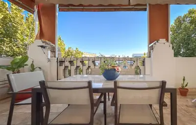 Un balcón o terraza de Charming 2 Bedroom Boutique Triplex Apartment with Private Terrace at Seville City Center by OCityzen