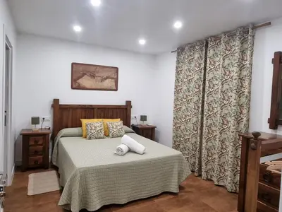 Cama o camas de una habitación en Hacienda Santa Barbara