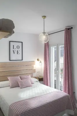 Cama o camas de una habitación en Casa Rural Las Cuevas de Setenil