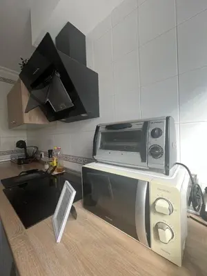 Una cocina o zona de cocina en Lovely Rooms en piso compartido