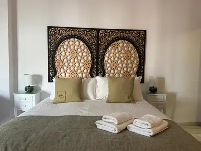 Cama o camas de una habitación en Apartamento La Abadesa de Córdoba