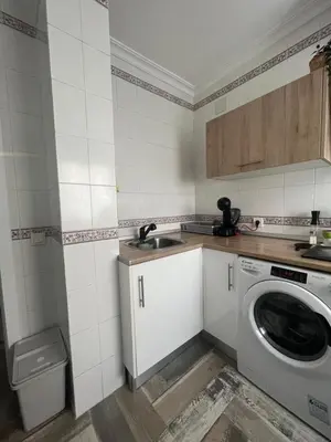 Una cocina o zona de cocina en Lovely Rooms en piso compartido