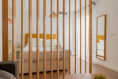 Cama o camas de una habitación en Lope20 - Bonito y moderno estudio en el centro de Jaén