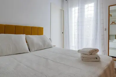 Cama o camas de una habitación en Lope20 - Bonito y moderno estudio en el centro de Jaén