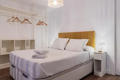 Cama o camas de una habitación en Lope20 - Bonito y moderno estudio en el centro de Jaén