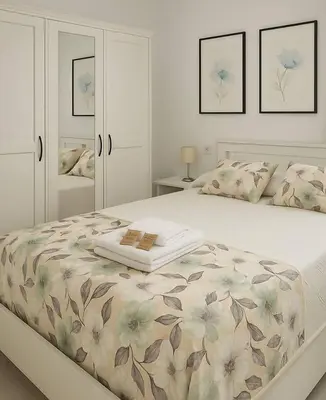 Cama o camas de una habitación en Alojamiento Baeza California 2A