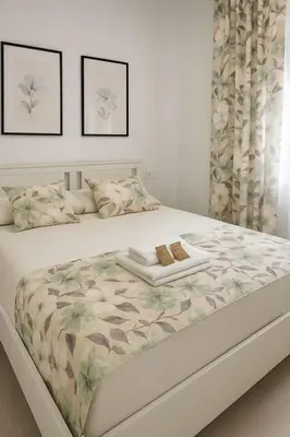 Cama o camas de una habitación en Alojamiento Baeza California 2A
