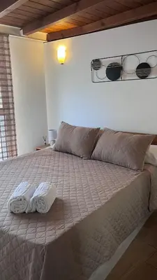 Cama o camas de una habitación en HINIESTA Centro