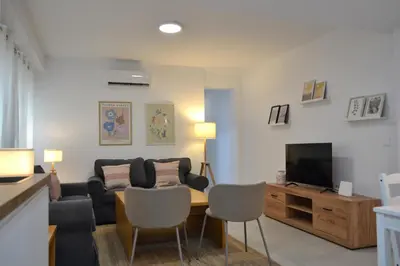 Una televisión o centro de entretenimiento en SunShine San Nicolas