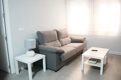 Zona de estar de Espectacular loft reformado en Córdoba by beBalmy