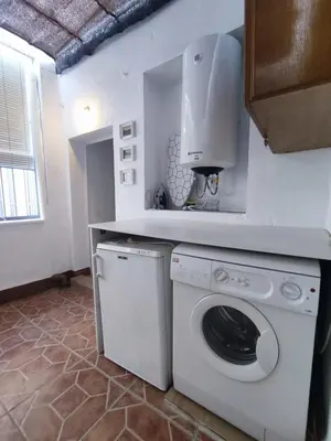 Una cocina o zona de cocina en Apartamento Turístico Córdoba Centro Jardín