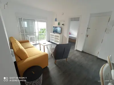 Una televisión o centro de entretenimiento en Savio apartamento