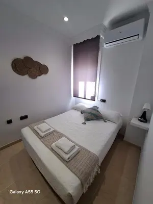 Cama o camas de una habitación en Apartamento Parral