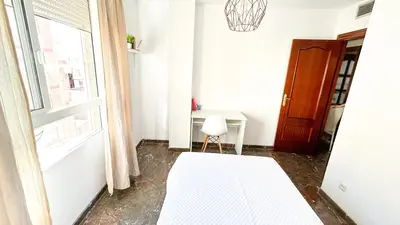 Cama o camas de una habitación en Piso compartido DELYRENT, zona CorteInglés