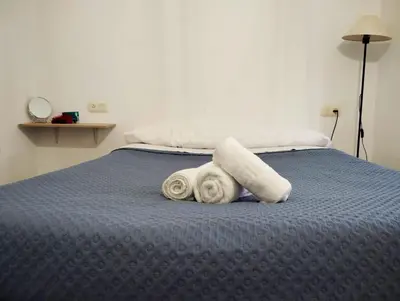 Cama o camas de una habitación en Piso compartido DELYRENT, zona CorteInglés