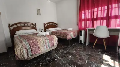 Cama o camas de una habitación en Piso compartido DELYRENT, zona CorteInglés