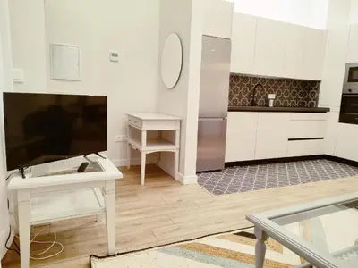 Una cocina o zona de cocina en NUEVO RIBERA Arcangel Suite