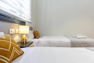 Cama o camas de una habitación en Alohamundi Cetina&Duque Montemar