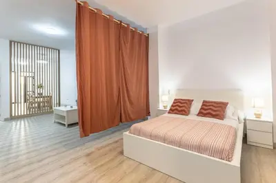 Cama o camas de una habitación en Semana Santa