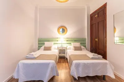 Cama o camas de una habitación en Apartamento Raya - Vacacional Sevilla