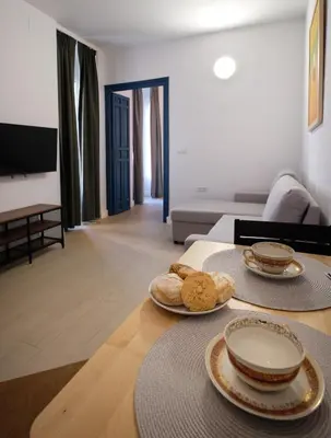 Una televisión o centro de entretenimiento en V11apartamentos 2