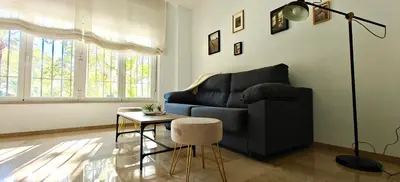 Zona de estar de Suite Deluxe Puerta de Almodóvar