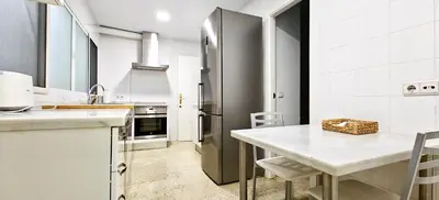 Una cocina o zona de cocina en Suite Deluxe Puerta de Almodóvar
