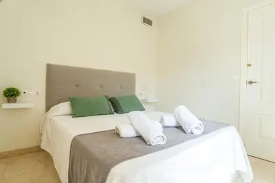 Cama o camas de una habitación en Gran Capitan Boulevard